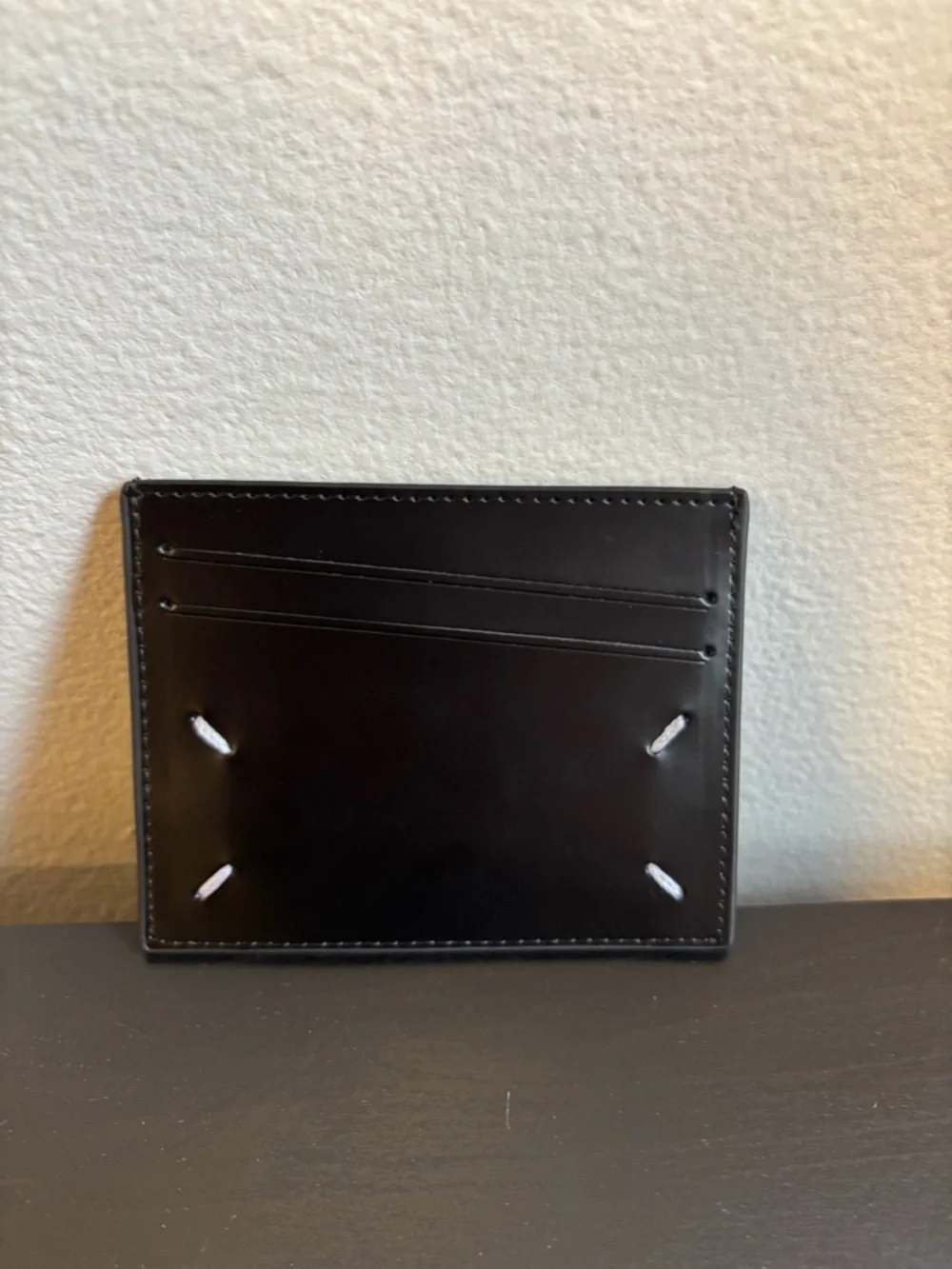 Maison margiela black leather cardholder holds 4 cards